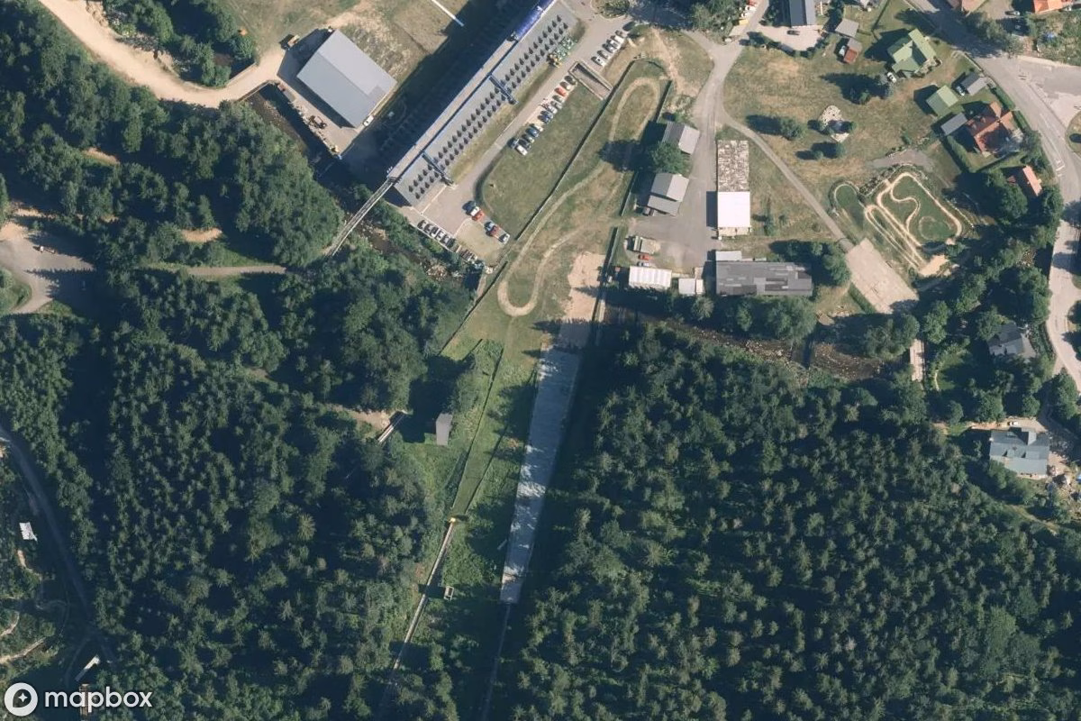 Aerial satellite view of Skischanze, an abandoned Sports Facility in Harrachov, Czechia