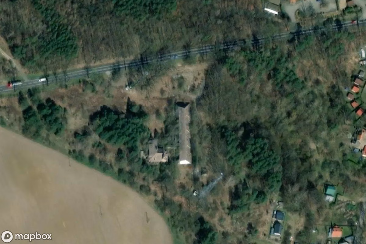 Aerial satellite view of Hôtel Pensjonat PRL, an abandoned Hotel in Długie, Poland