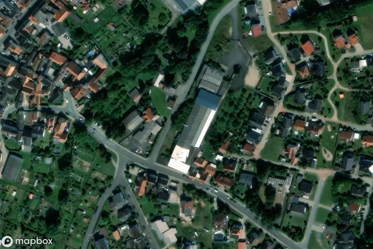 Aerial satellite view of Käserei, an abandoned Factory in Hüttenberg, Germany