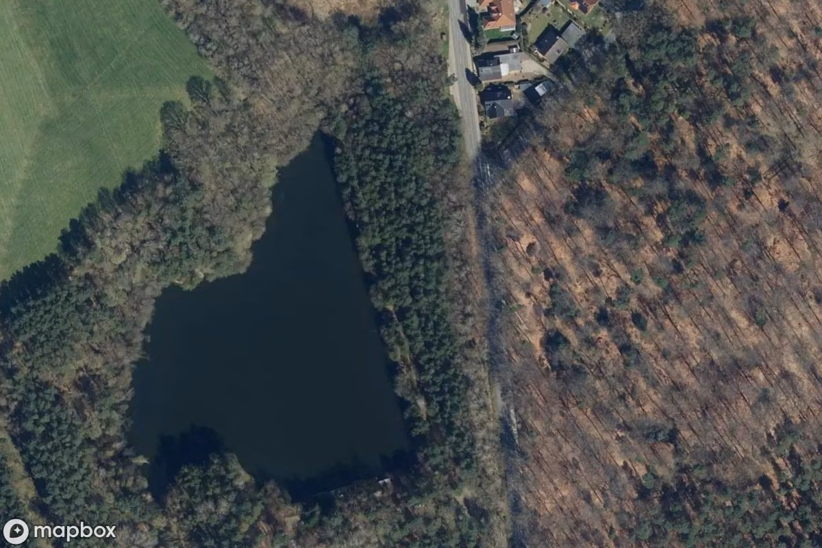 Aerial satellite view of Bagger, an abandoned Vehicle in Gnarrenburg, Germany