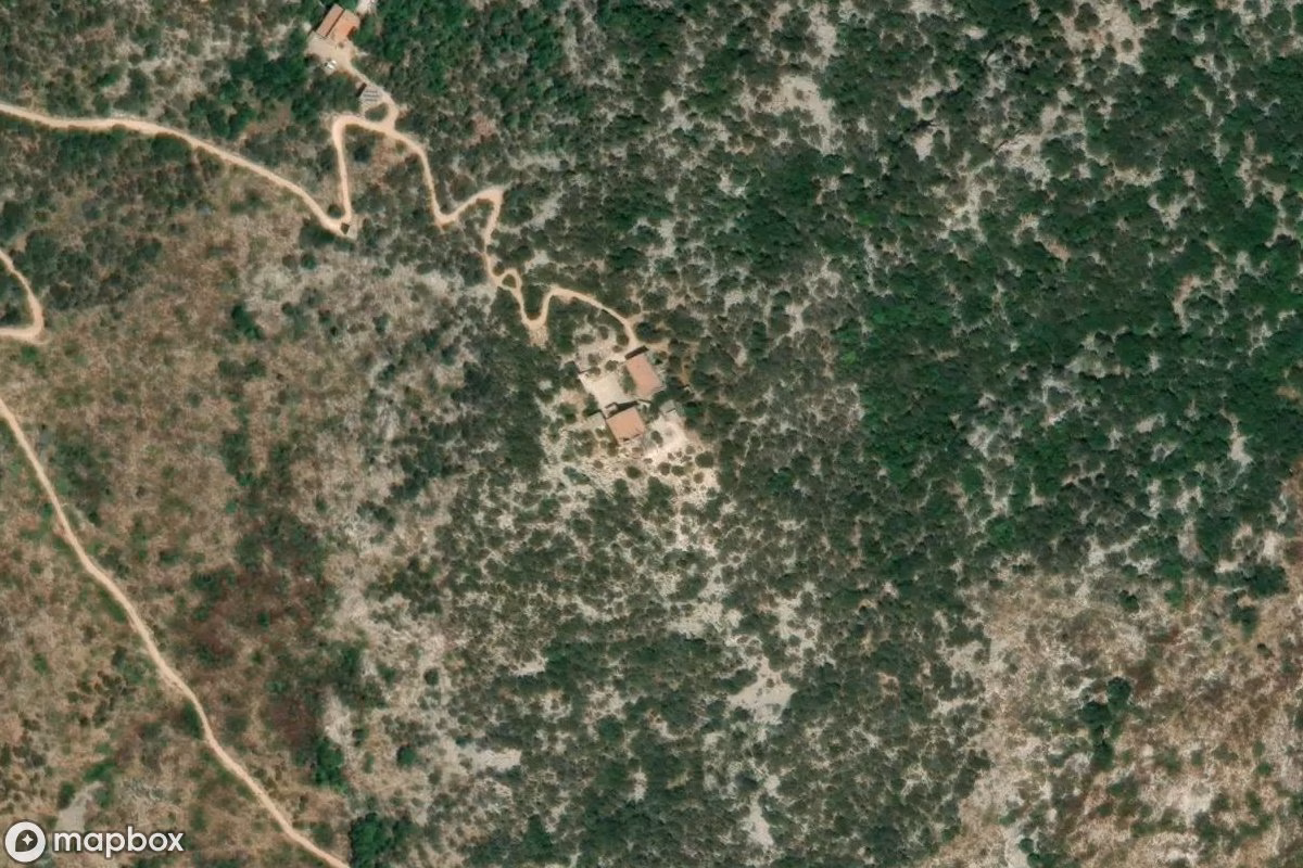 Aerial satellite view of Leuchtturm Capo Figari, an abandoned Tower in Figari/Golfo Aranci, Italy