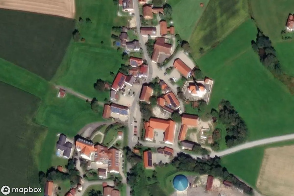 Aerial satellite view of Gasthaus, an abandoned in Eiberg, Germany
