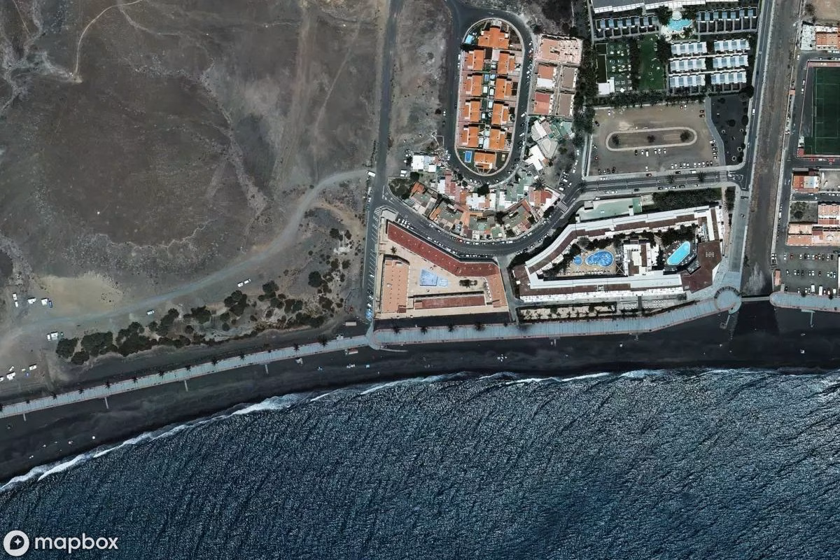 Aerial satellite view of Hotel, an abandoned Hotel in Urbanización Puerto Azul, Spain
