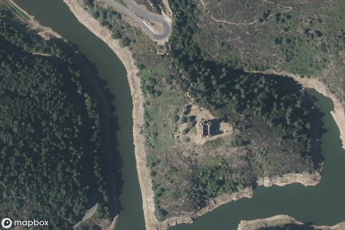 Aerial satellite view of Château de la Rivière, an abandoned Castle in Alleuze, France