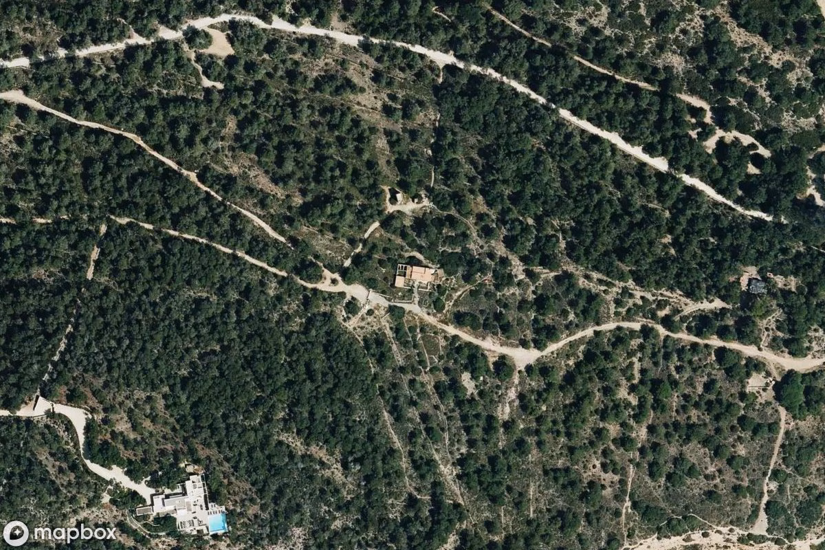 Aerial satellite view of Haus, an abandoned  in Santa Eulària des Riu, Spain
