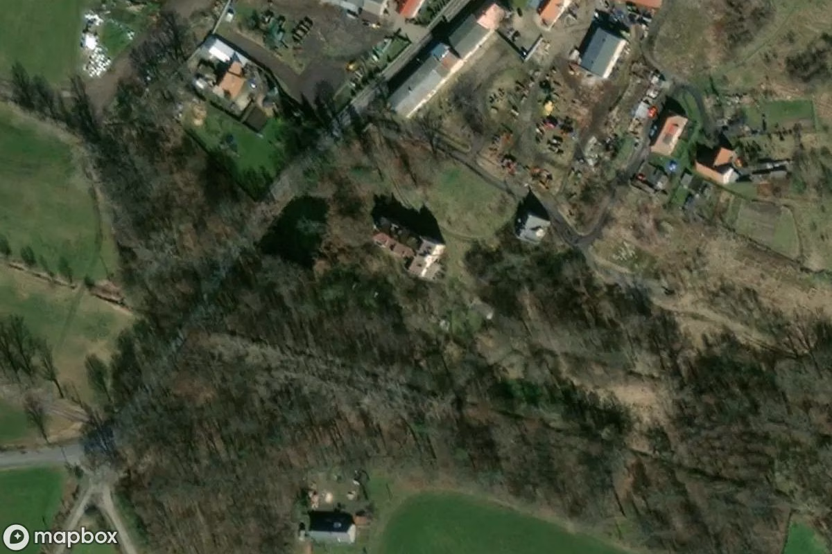 Aerial satellite view of Palais und Kutscherhaus, an abandoned Residence in Czernina, Poland