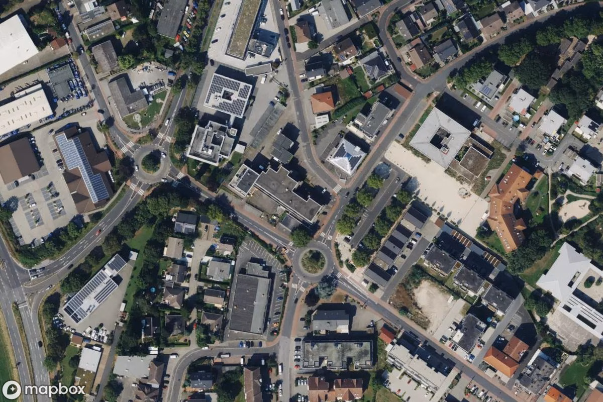 Aerial satellite view of Rathaus und Sparkasse, an abandoned  in Langendiebach, Germany