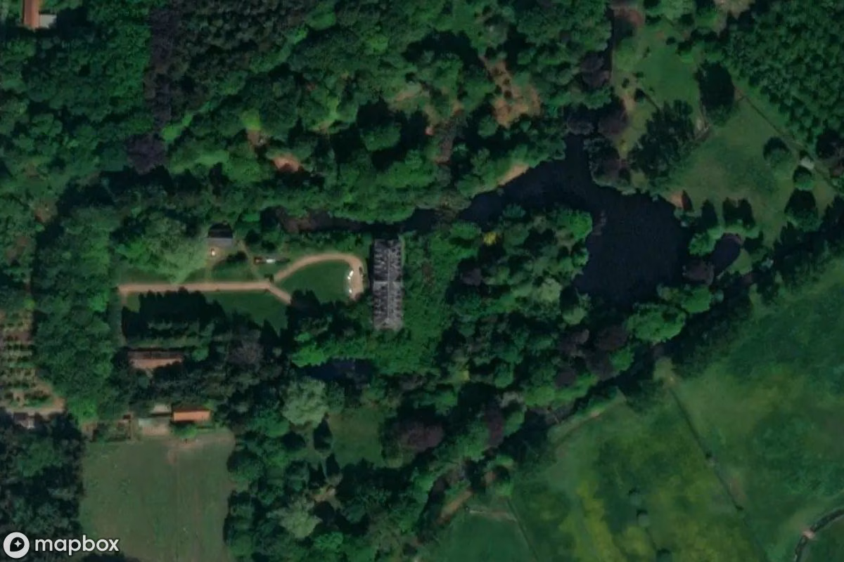Aerial satellite view of Schloss der Traktoren, an abandoned in Zandhoven, Belgium