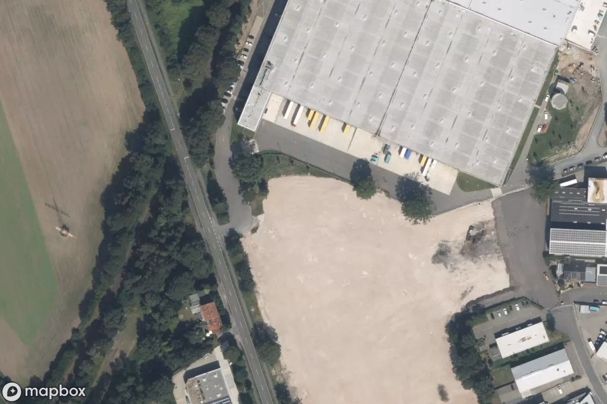 Aerial satellite view of Weberei Lagerhallen, an abandoned Industrial Site in Rheine, Germany