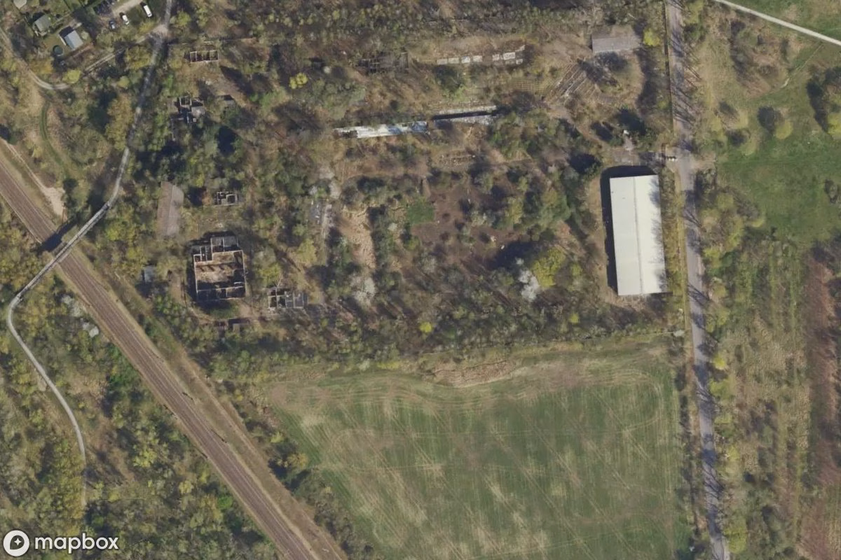Aerial satellite view of Übungsgelände, an abandoned  in Berlin, Germany