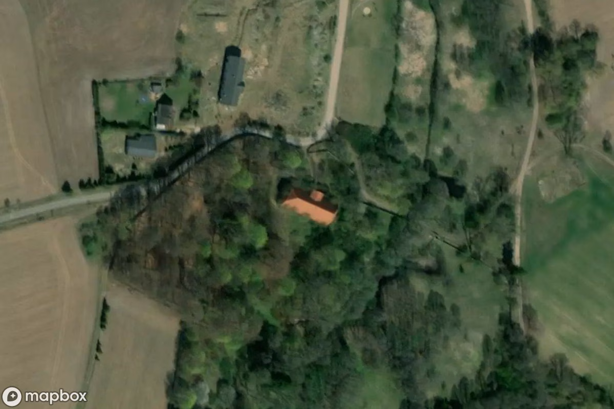 Aerial satellite view of Manoir Dworski, an abandoned Residence in Żelki, Poland