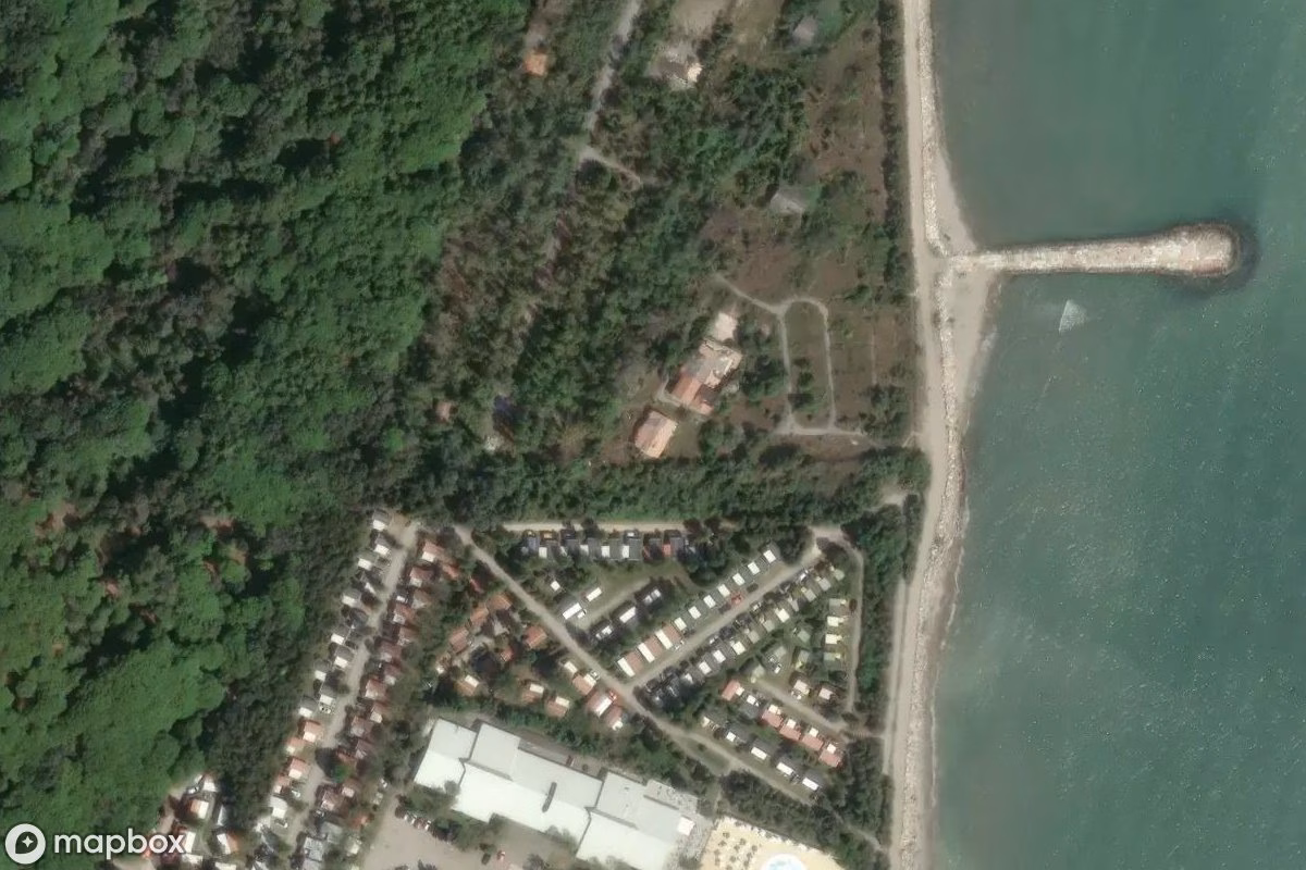 Aerial satellite view of Campingplatz, an abandoned Sports Facility in Rosolina Mare, Italy