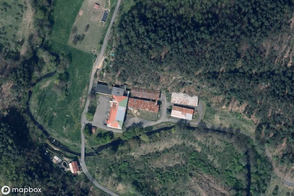 Aerial satellite view of Unterirdische Fabrik Rabstein, an abandoned Factory in Janská, Czechia