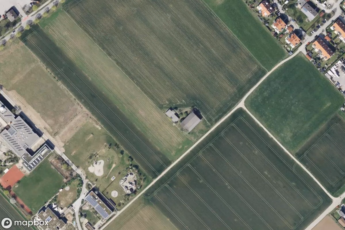 Aerial satellite view of Scheune, an abandoned Farm in Gilching, Germany
