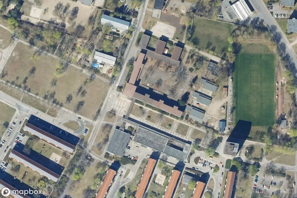Aerial satellite view of Schule, an abandoned School in Eisenhüttenstadt, Germany