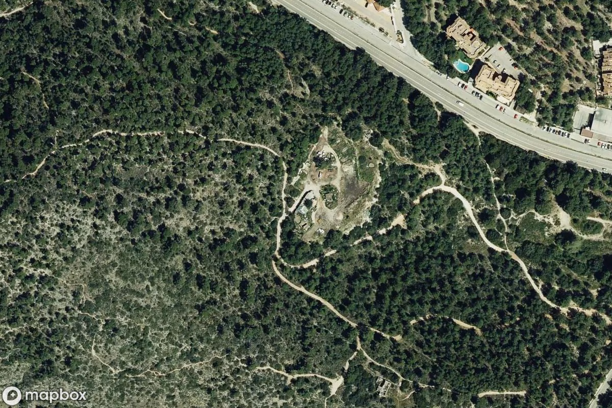 Aerial satellite view of Ruine, an abandoned Ruin in Cala Fornells, Spain