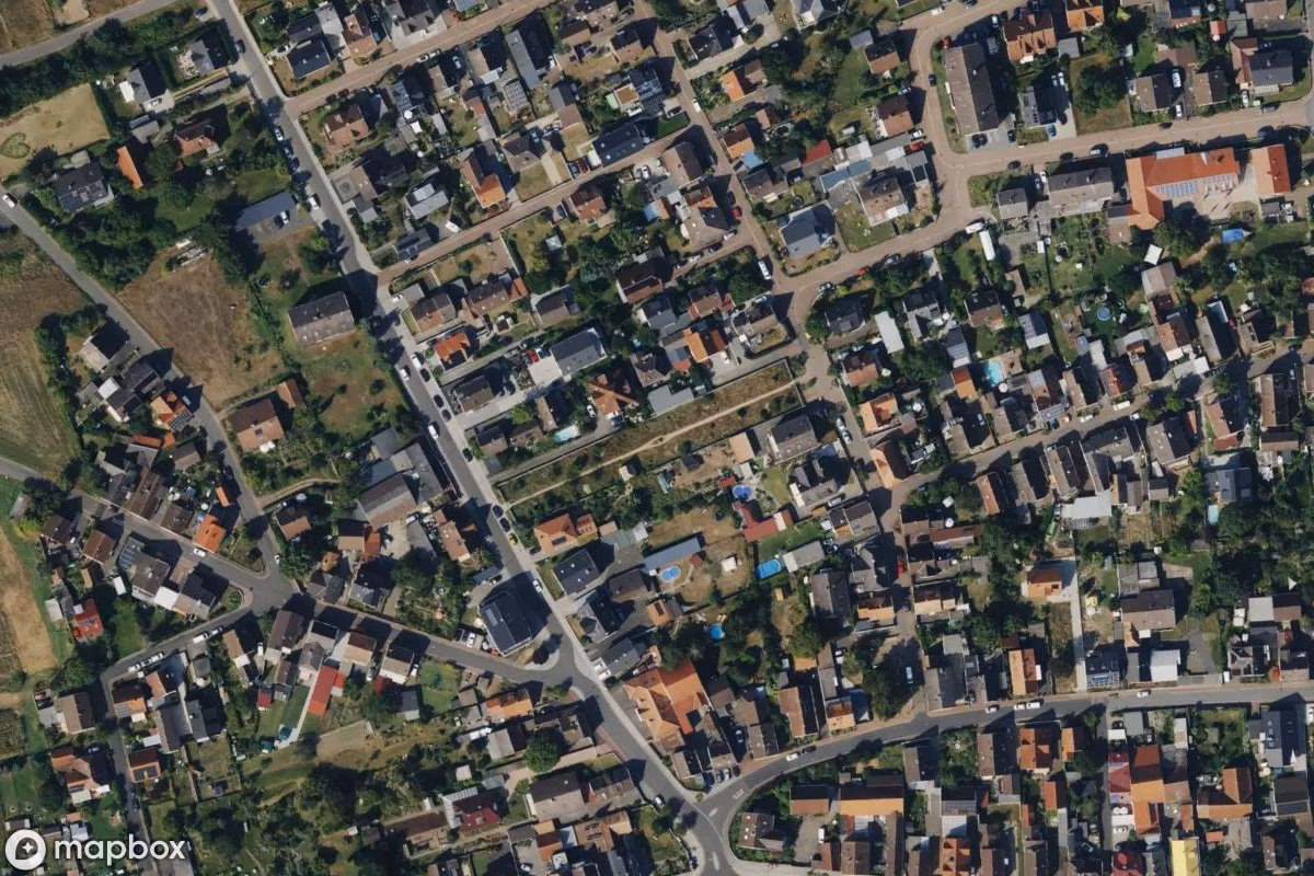 Aerial satellite view of Friedhof, an abandoned Cemetery in Großwelzheim, Germany