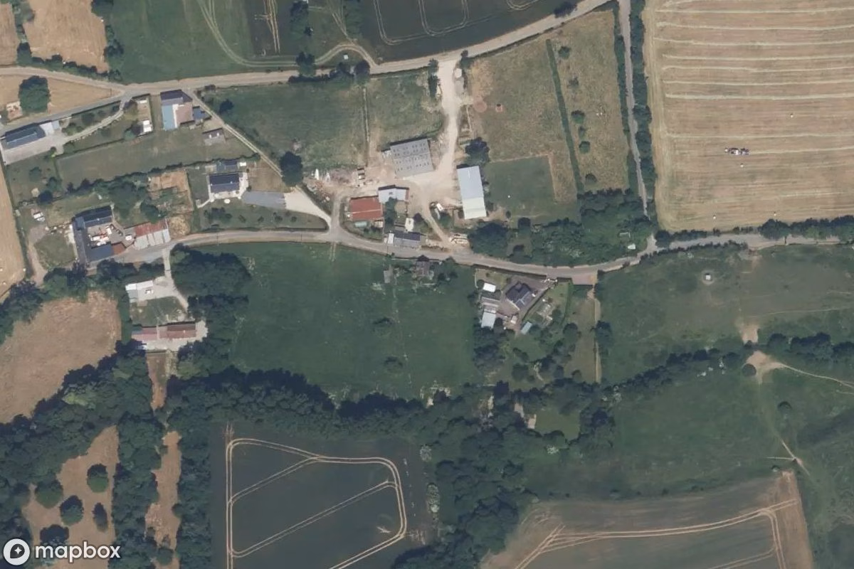 Aerial satellite view of Roter Backstein, an abandoned Factory in Fontenay-le-Pesnel, France