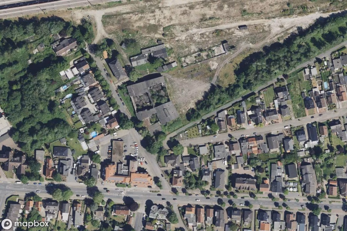 Aerial satellite view of Bahnhofsgebäude, an abandoned Railway Station in Delmenhorst, Germany