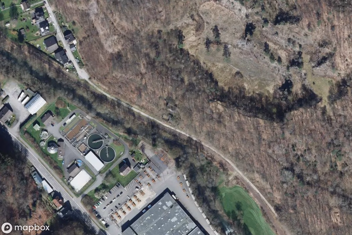 Aerial satellite view of Ehemalige Steinbrecheranlage, an abandoned  in Wiehl, Germany